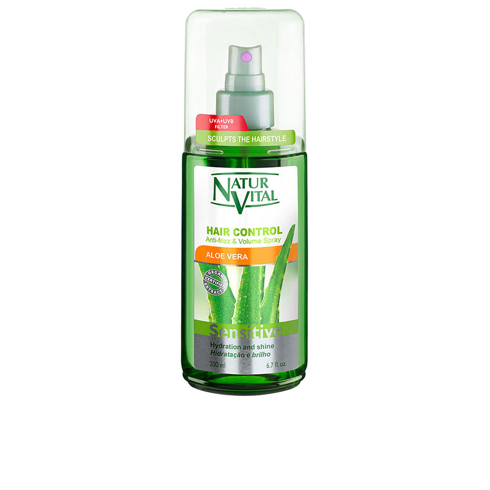 Spray coiffant disciplinant